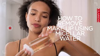 How to remove make up using micellar water  Clarins [upl. by Nahgrom802]